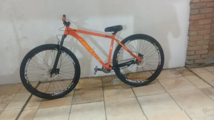 Bicicleta absolute Nero 4 laranja
