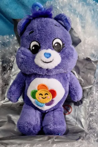 Ursinhos carinhosos da Cacau Show roxo