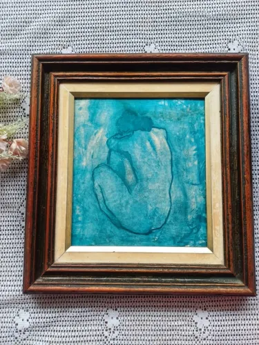 Quadro reprodução emoldurada da famosa pintura "Nu Azul" (Blue Nude) de Pablo Picasso.