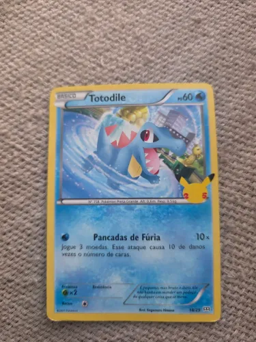 Carta pokemon rara totodile 25 borda amarela