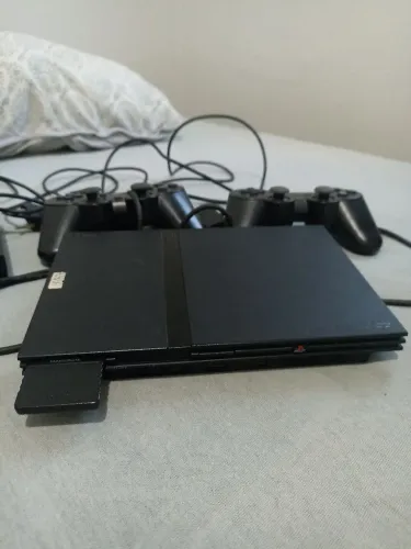 Playstation 2 desbloqueado e com 2 controle.