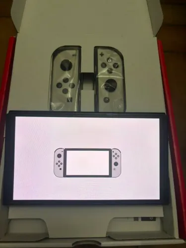 Nintendo Switch Oled, completo e impecavel + grips, case Zelda + MicroSd 500Gb