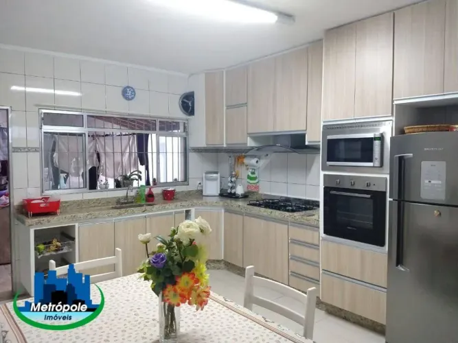 Sobrado com 5 dormitórios à venda, 600 m² por R$ 615.000,00 - Parque Continental - Guarulh