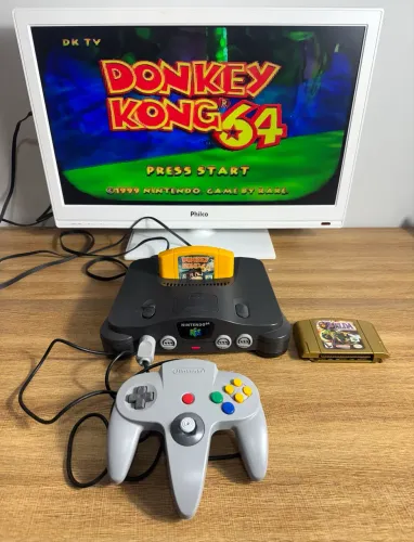 Nintendo 64 + Expansion pak + cartuchos