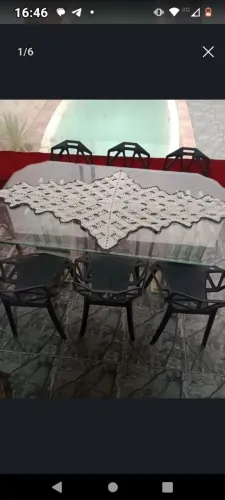 Mesa de travertino com tampo de vidro bisotê 