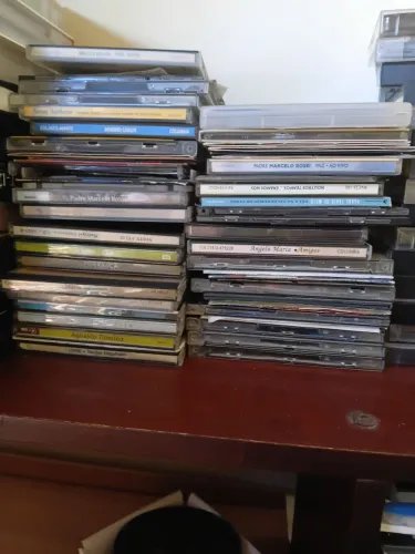 CDs, DVDs e Discos de Vinil