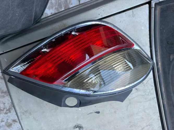 Lanterna esquerda lado do motorista vectra gt 