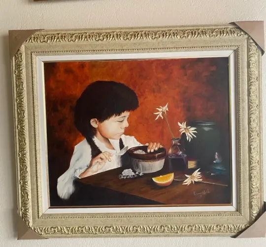 Quadro menina na mesa