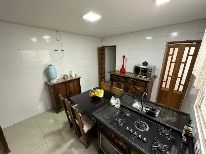 Casa com 3 dormitórios à venda, 175 m² por R$ 600.000,00 - Vila Guilhermina - Praia Grande