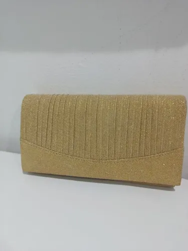 Vendo vestido e bolsa semi nova 