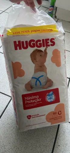 92 fraldas Huggies TAM G