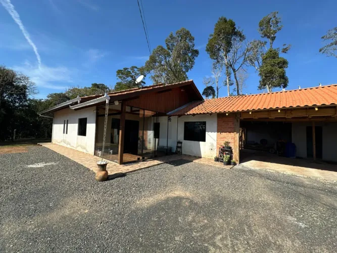 Terreno com casa a venda em Campo Alegre/SC.