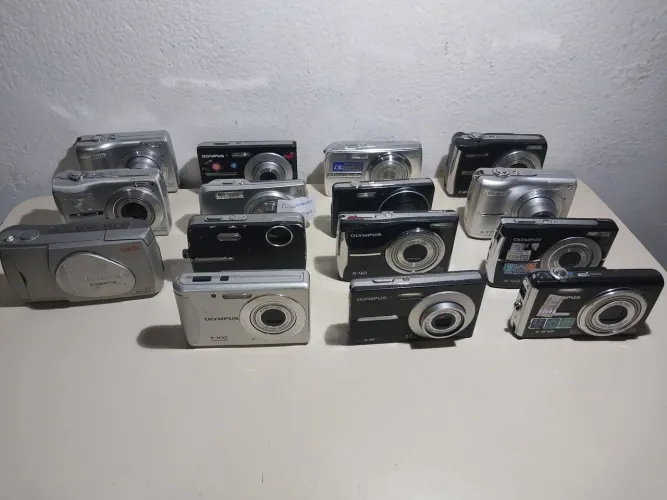 15 câmeras Olympus com defeito para conserto ou decoração