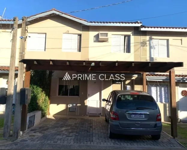Sobrado venda em condomínio fechado com 3 dormitórios e 2 vagas cobertas - Igara/Canoas -