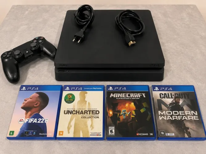 PS4 Slim + controle + cabos + FIFA 22, Minecraft, COD MW e Uncharted. Ótimo estado!
