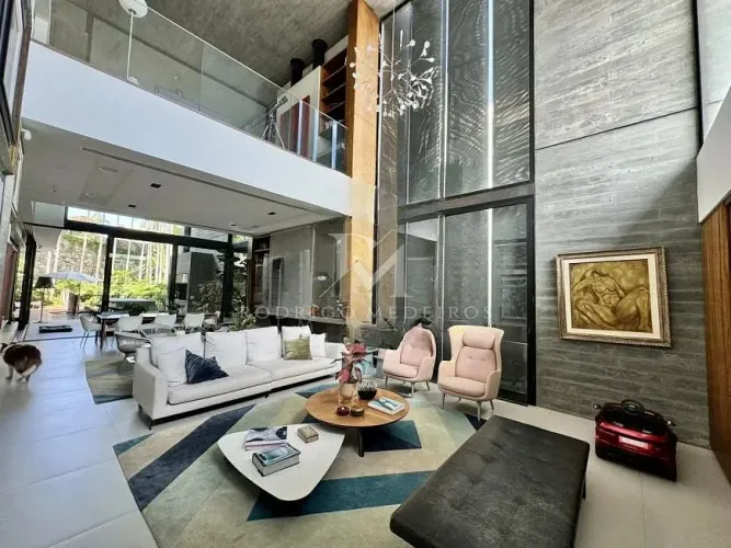 Casa em condomínio frente mar com 5 suítes em Cacupé, Florianópolis