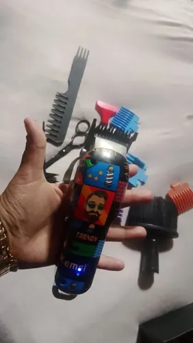 Aparelho elétrico de corte e barbear 
