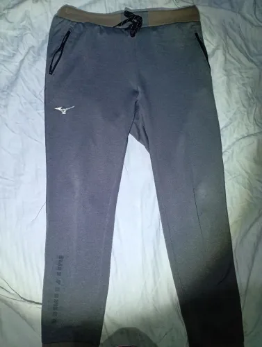 Calça Mizuno original cinza tam G 96% algodão 4% elastano. 2 bolsos com zíper e um cordão