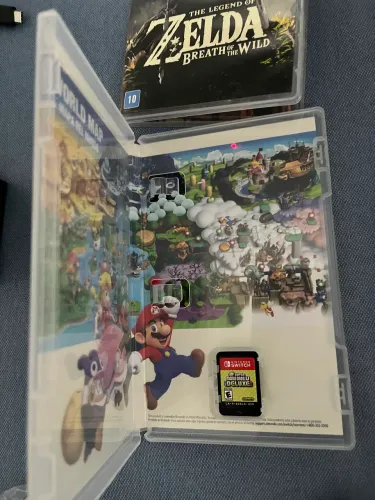 Nintendo Switch Oled - 64GB Acessórios originais + 1 jogo, case, película e grip.