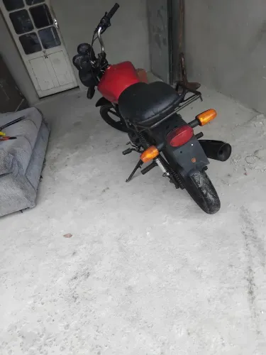 Ta andando