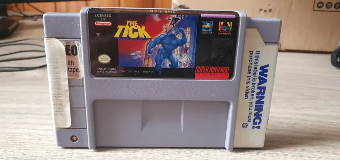 The Tick super nintendo com as etiquetas originais da Blockbuster USA fita 100% original