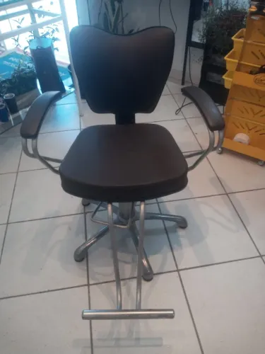Cadeira de cabeleireiro(a)