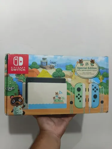 Nintendo Switch Edição Animal Crossing Completo na Caixa.