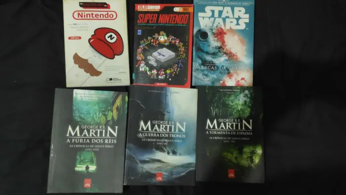 Lote livros Gerra dos tronos, star Wars, Nintendo, dvds