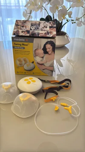 Bomba Tira Leite Elétrica Dupla Swing Maxi extratora mãos livre - Medela
