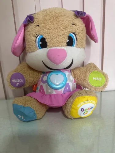 Pelúcia Irmã Cachorrinh Fisher-price fala em português 