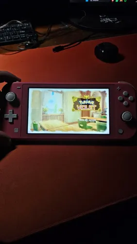 Nintendo Switch Lite Coral + Cartão
