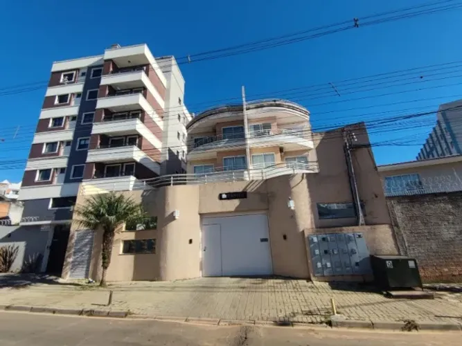 Apartamento 2 quartos, 1 vaga, sacada grande com área de Churrasqueira Centro 