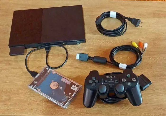 PlayStation 2 Slim com 500GB + Jogos - R$ 400