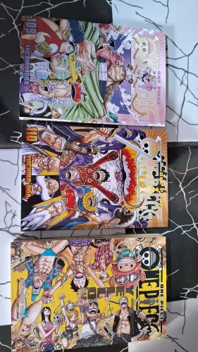 Mangás One Piece volumes 109, 110, 111, 112, 113 e a enciclopedia Yellow Grandes Elementos