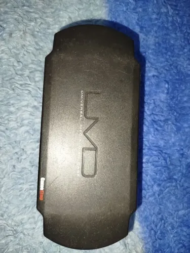 Porta UMD + Jogos Loose e Memory Cards