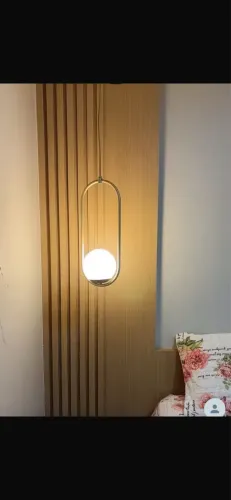 Lustre pendente globo dourado