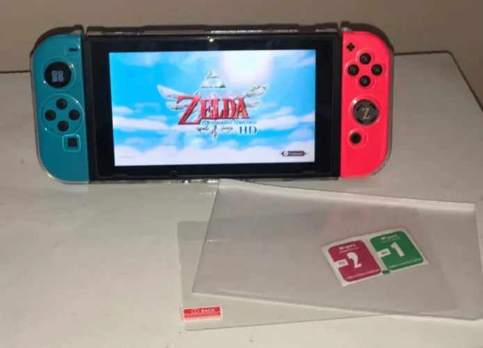 case transparente para nintendo switch + pelicula + grip de zelda