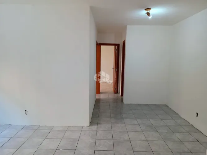 Apartamento terreo, 2 dormitórios, living 2 ambientes, cozinha, area de serviço, Bairro Vi