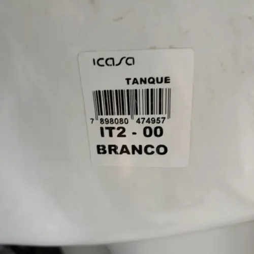 Tanque de lavar roupa em louça branca