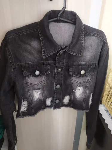 Jaqueta jeans, na cor preta com lavagem estonada, Tam M