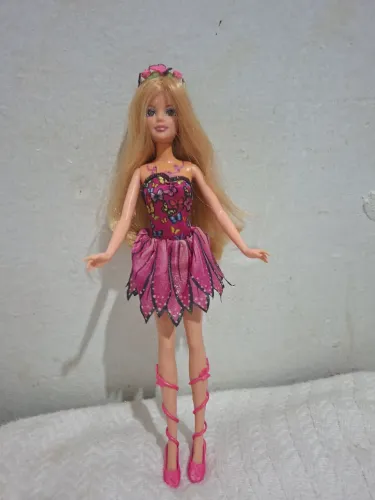 Boneca barbie buterfly original sem as asas em ótimo estado.