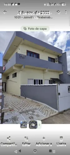 Ótimo sobrado com 3apartamtos e uma kitnet