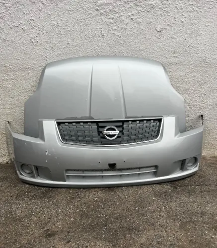 Capo parachoque farol Nissan Sentra 2010/2014