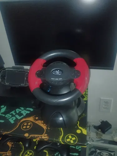 Vendo volante compatível para Playstation 2 e Playstation 3 e também é compatível para PC
