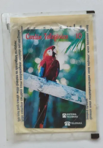 Cartão telefônico lacrado Arara Vermelha