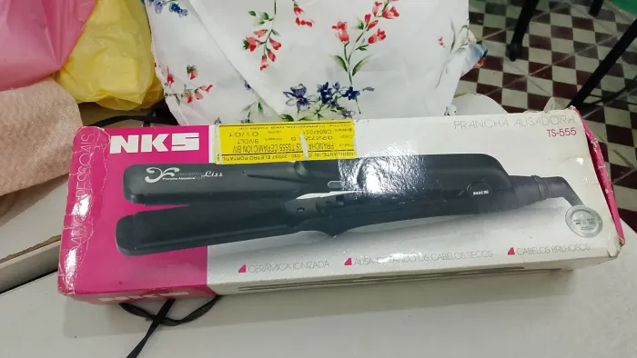 PRANCHA ALISADORA R$50,00