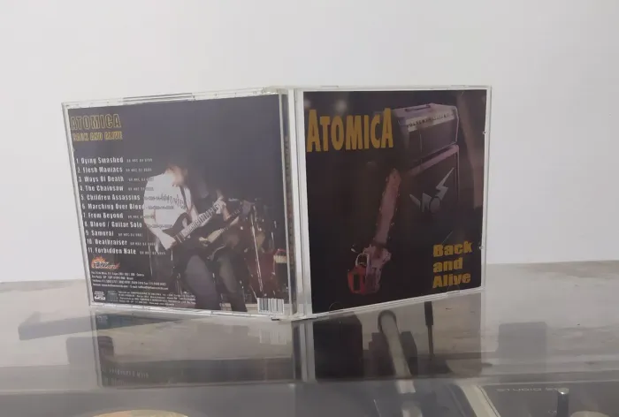 CD Atomica - Back and Alive