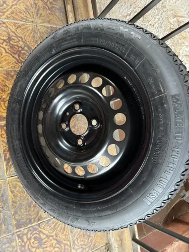 Estepe Nissan Kicks 125/90/15 completo roda mais pneu