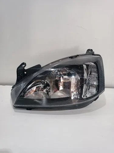 Farol Esquerdo Chevrolet Corsa Montana 2003/2012 ORIGINAL Máscara Negra (Recondicionado)