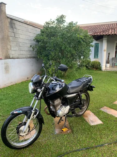 Vendo titan 150 8500$ preço a negociar tá com um 4mm e um comando